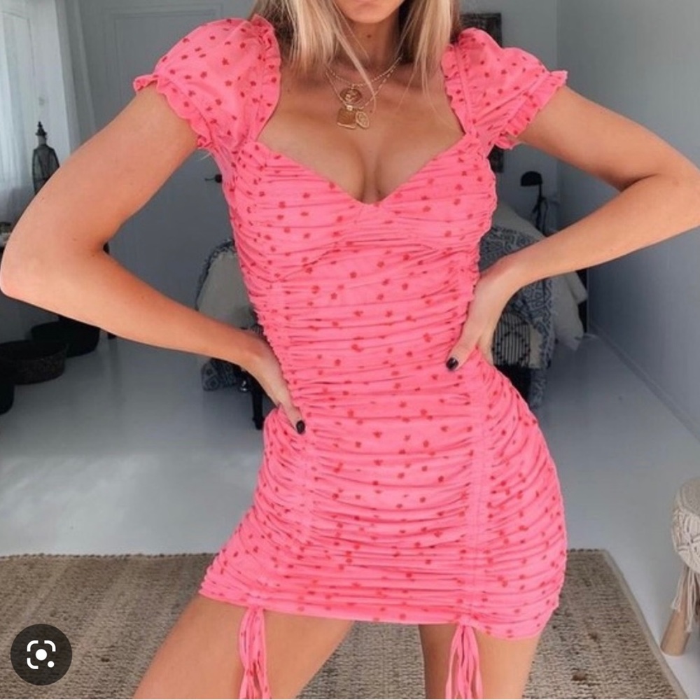 Pink ruched mini dress with flowers
